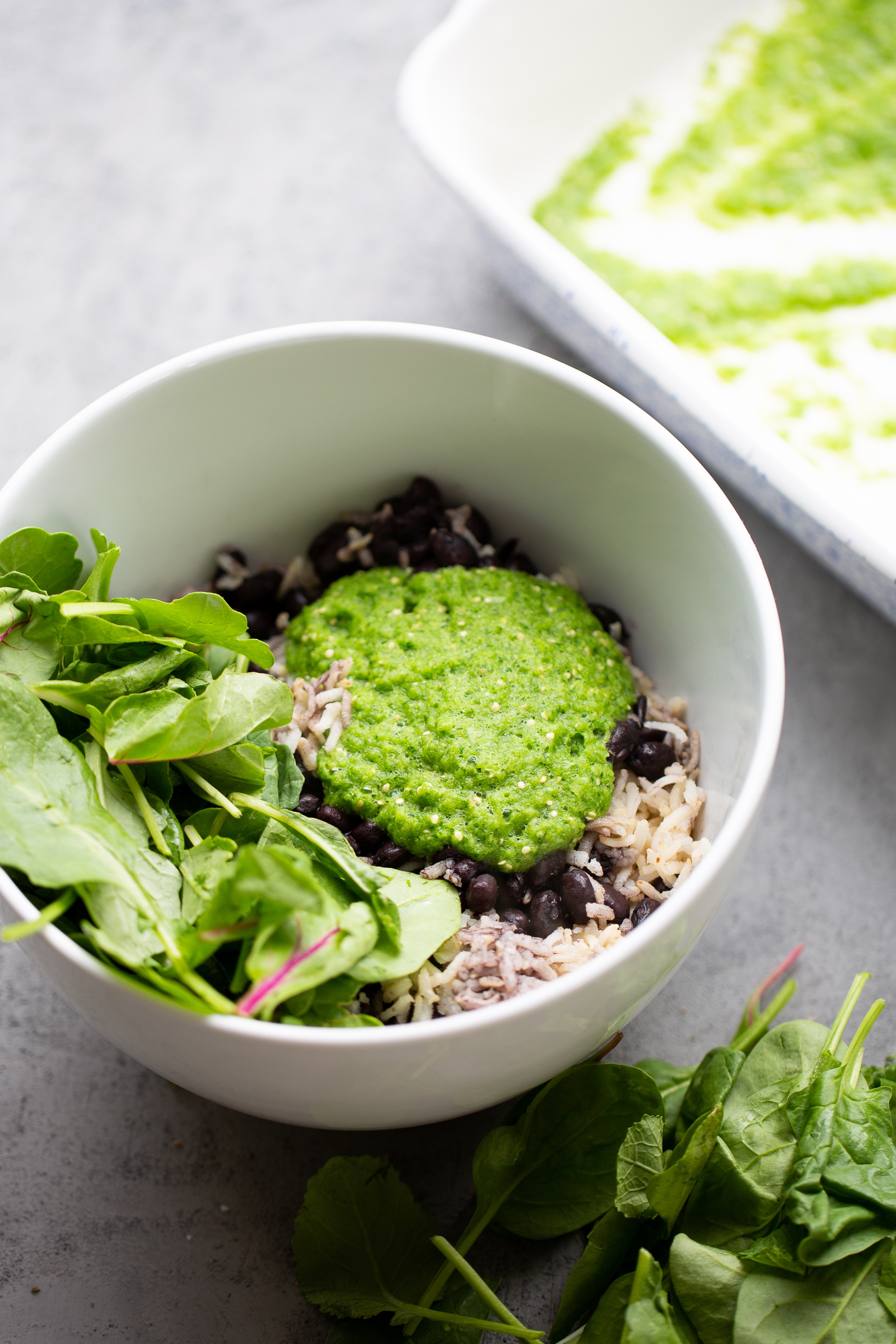 spinach, greens, salsa verde and rice enchiladas