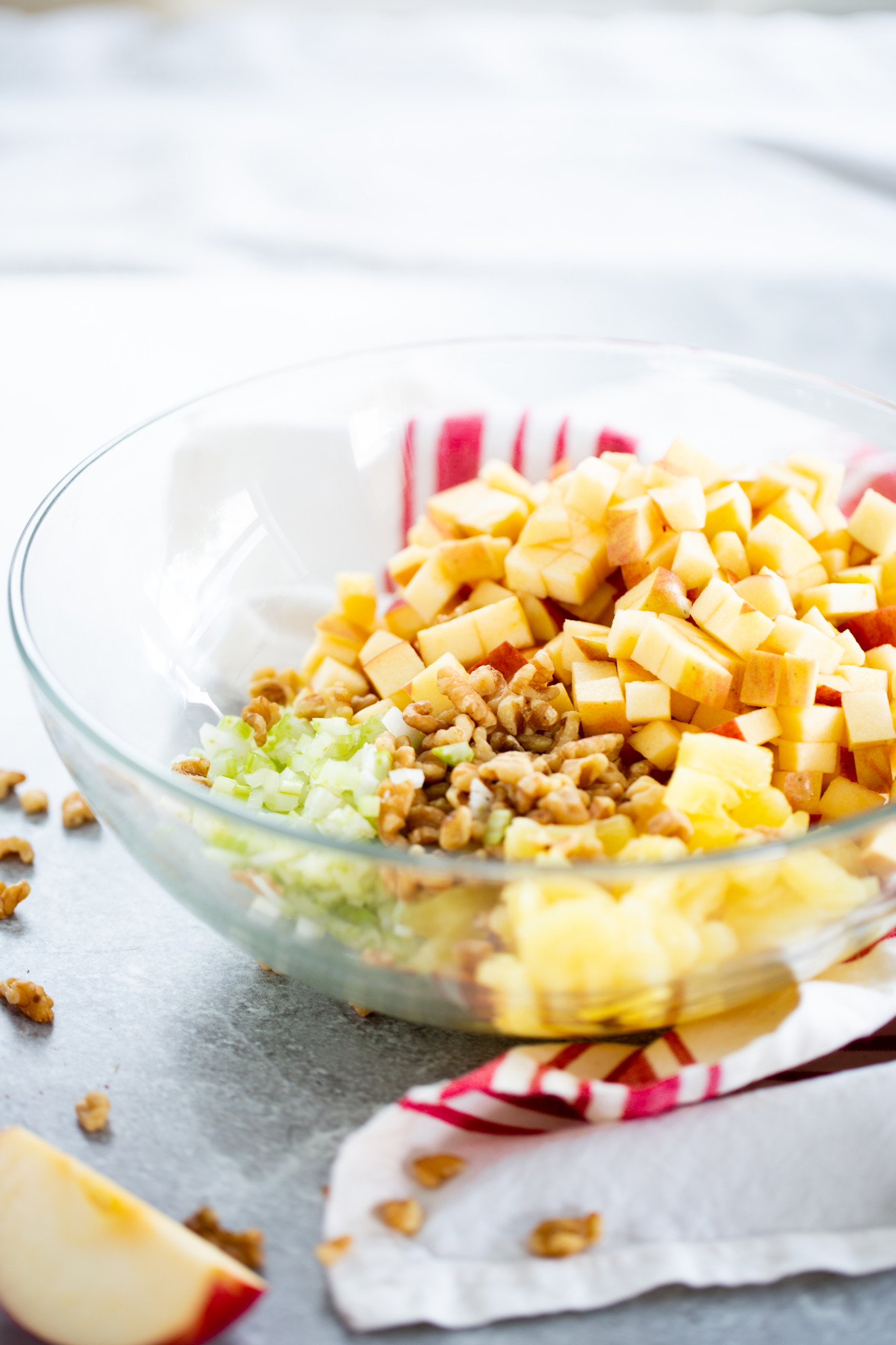 apples and other ingredients to make christmas salad