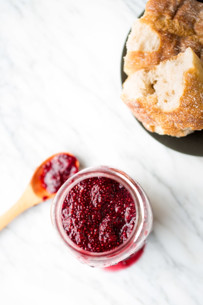 Berry chia seed jam in a mason jar.