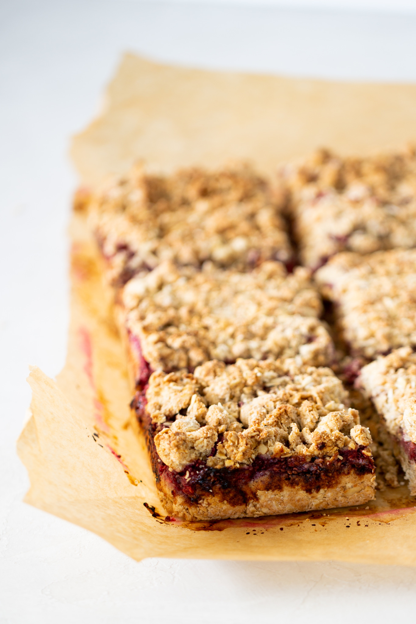Healthy Raspberry oatmeal bars (vegan recipe) cut into squares