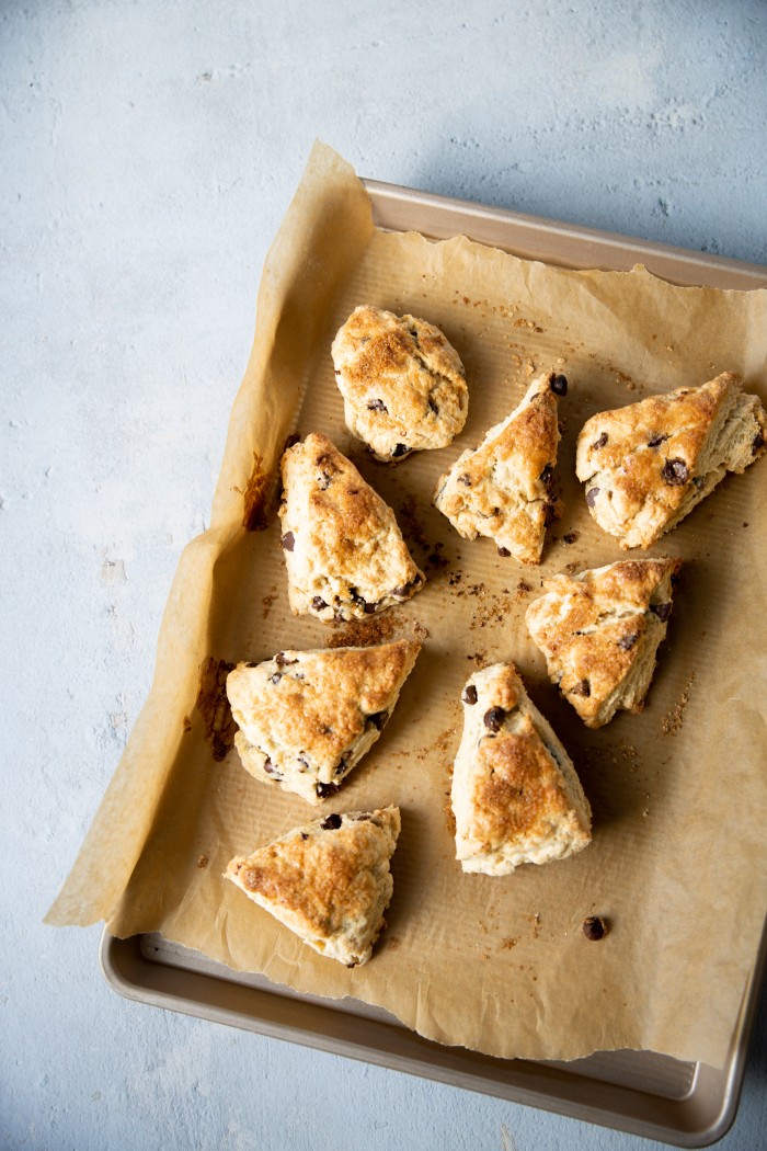 Vegan chocolate chip scones on a baking sheet