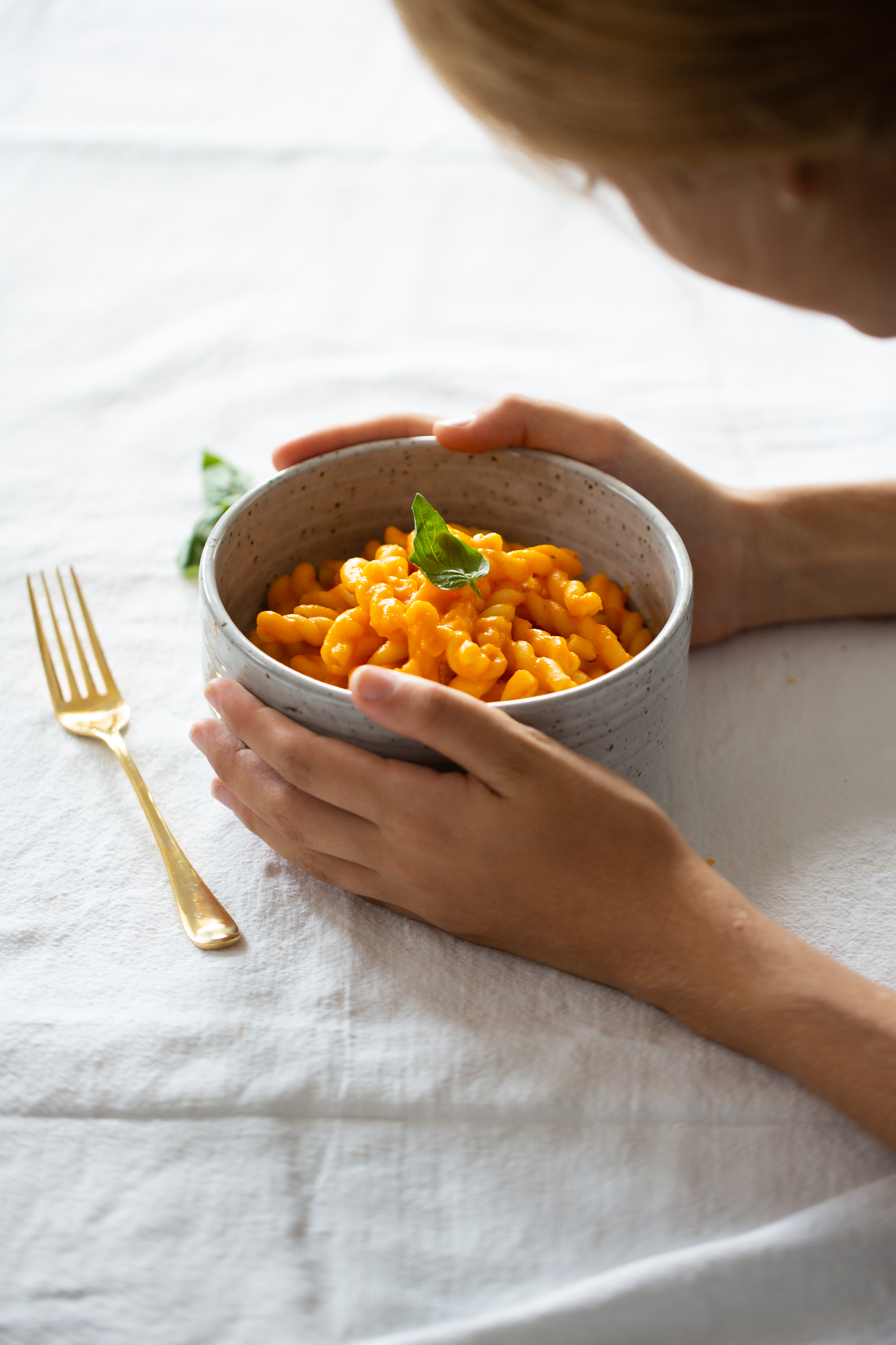 butternut squash and tomato pasta in a bowl 