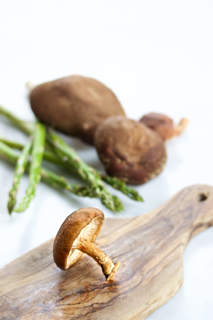 Shiitakes on a cutting board.