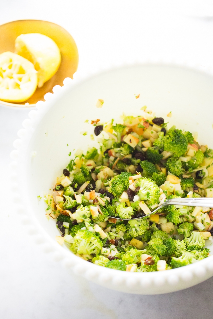 white salad bowl with apple broccoli salad