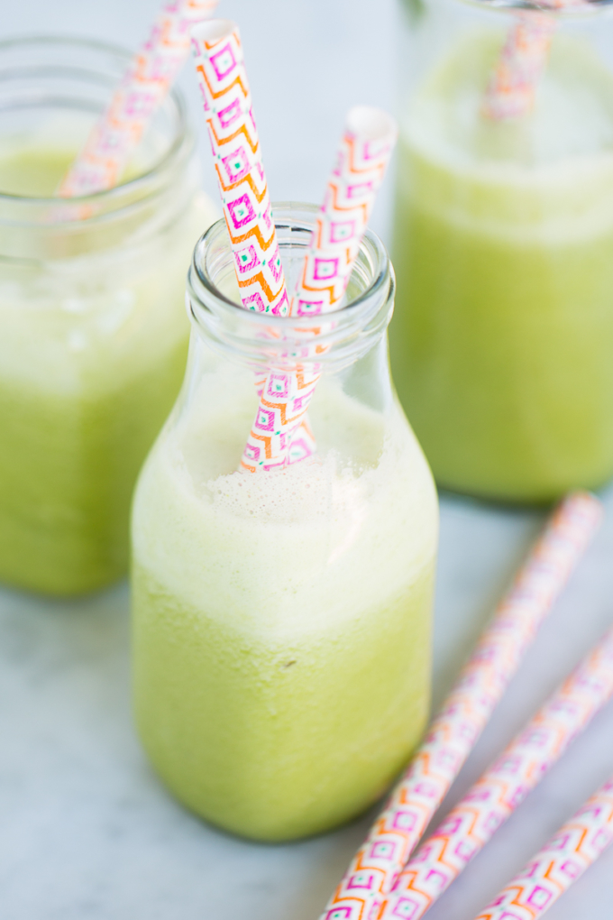 Pineapple, green leaves and banana smoothie. Pineapple smoothie.