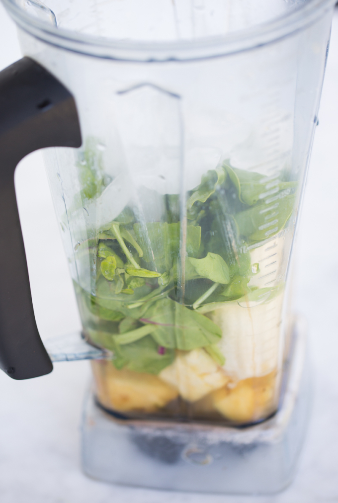 Pineapple, green leaves and banana smoothie ingredients. Pineapple smoothie.