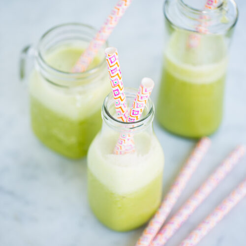 Pineapple, green leaves and banana smoothie. Pineapple smoothie.