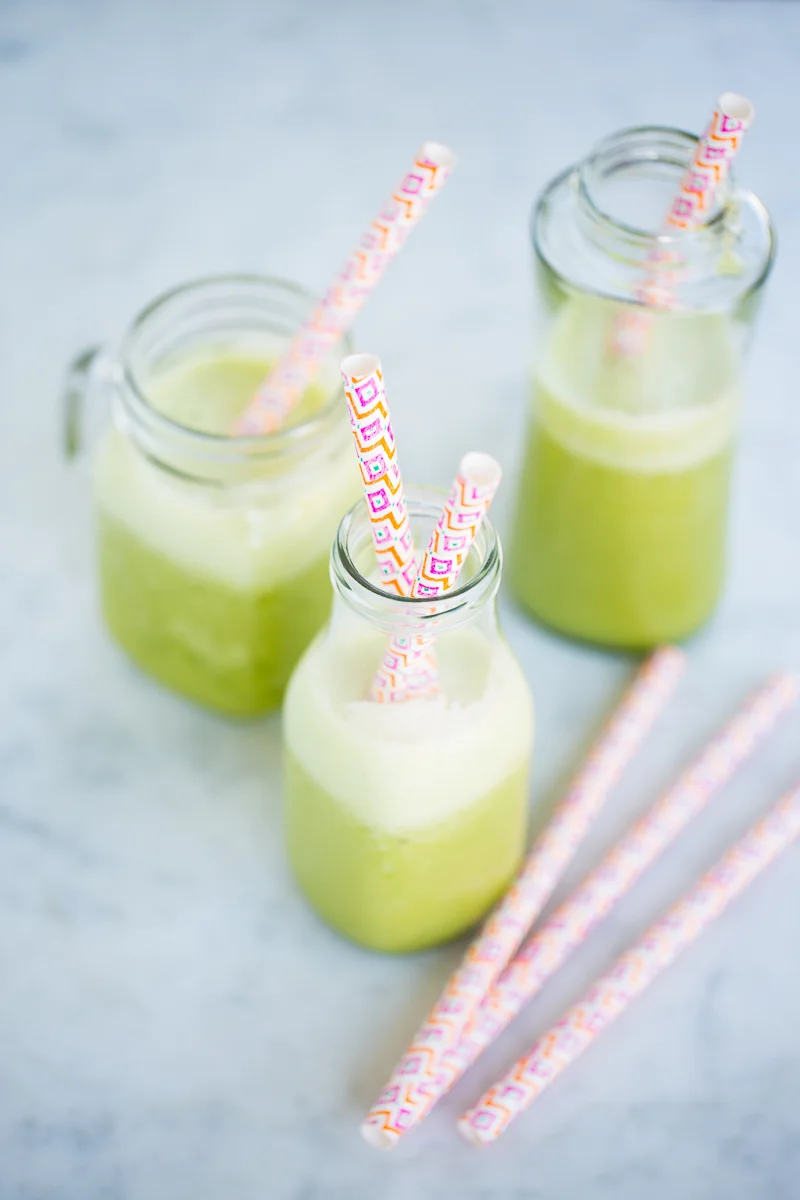 Pineapple, green leaves and banana smoothie. Pineapple smoothie.