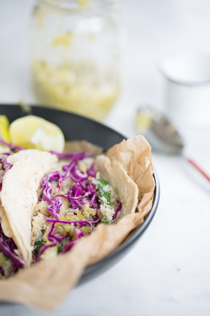 Vegan zucchini tacos with salsa verde an red cabbage