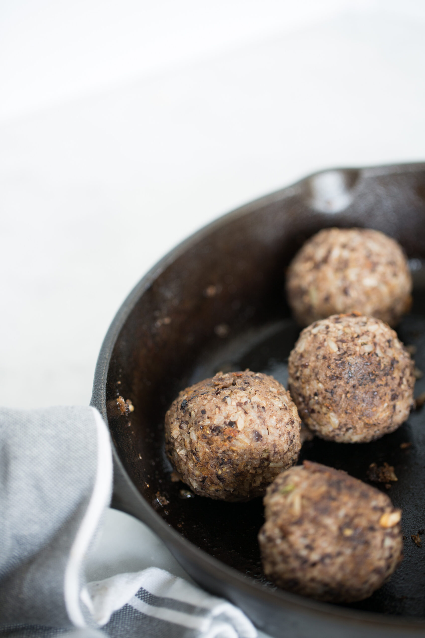 vegan meatballs in a cast iron skillet