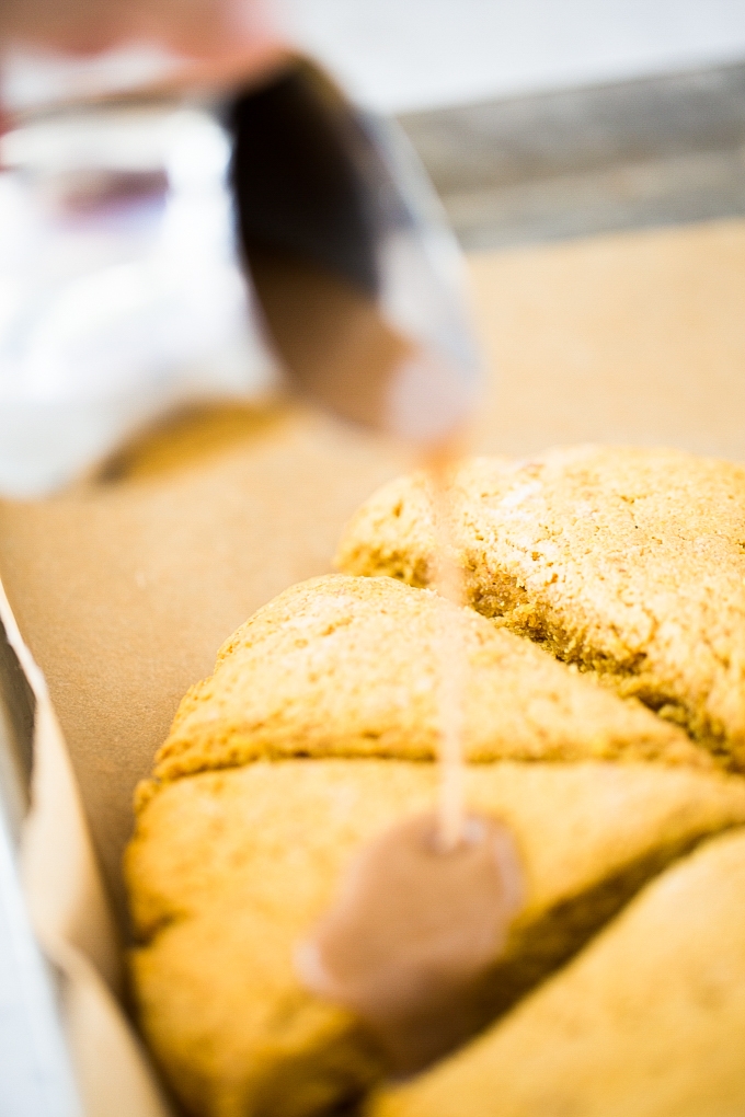 pouring glaze ove pumpkin scones