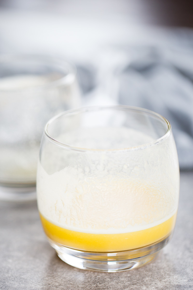 glass with Pineapple ginger juice with apples