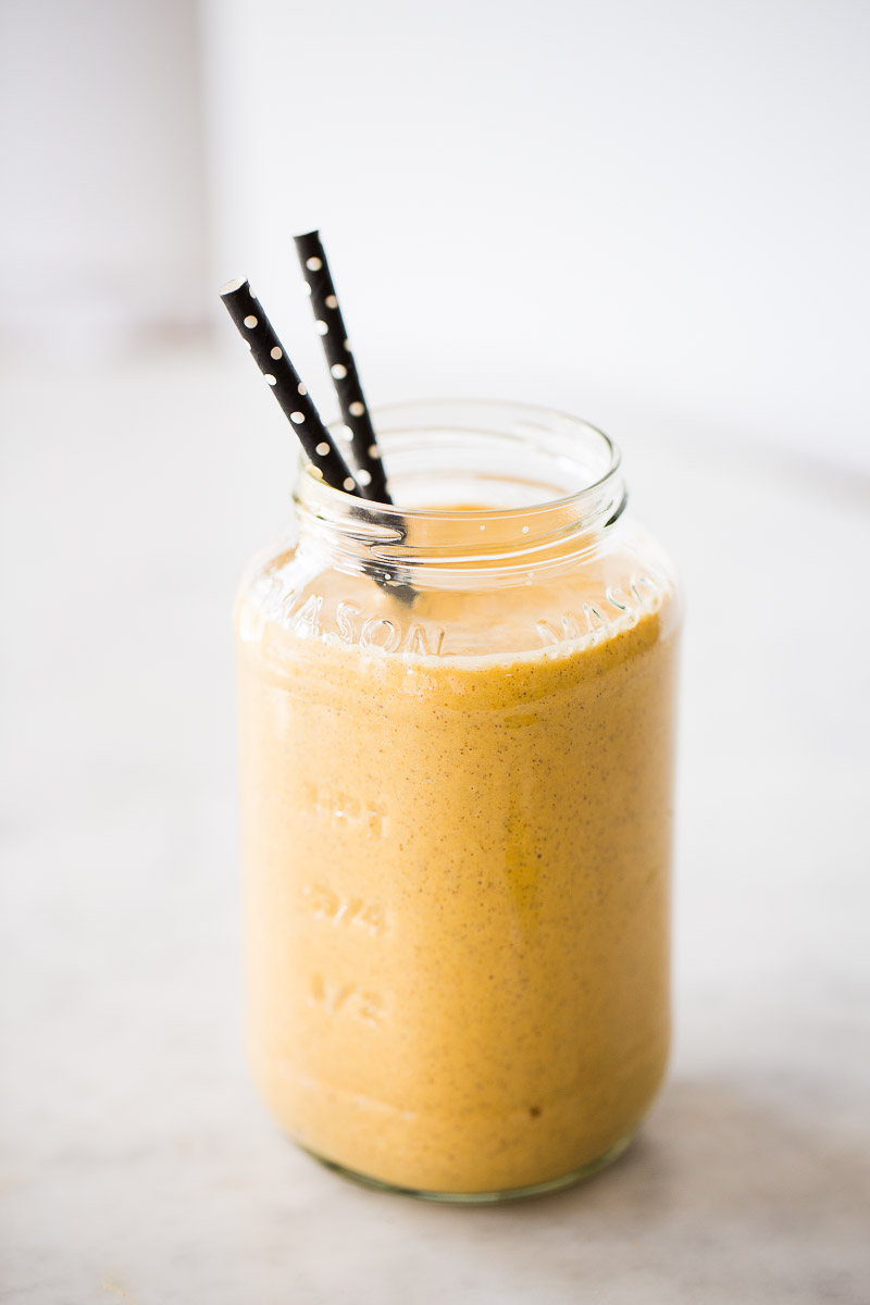 Carrot cake flavored orange smoothie in a mason jar