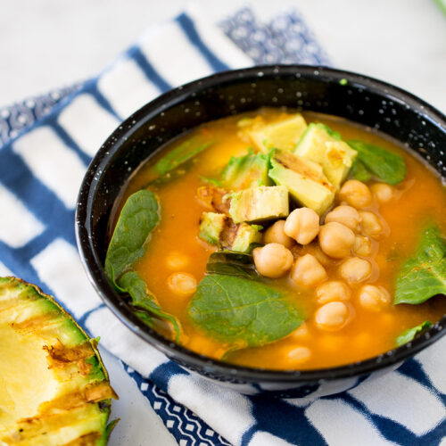 Chickpea soup with roasted avocado and charred lime