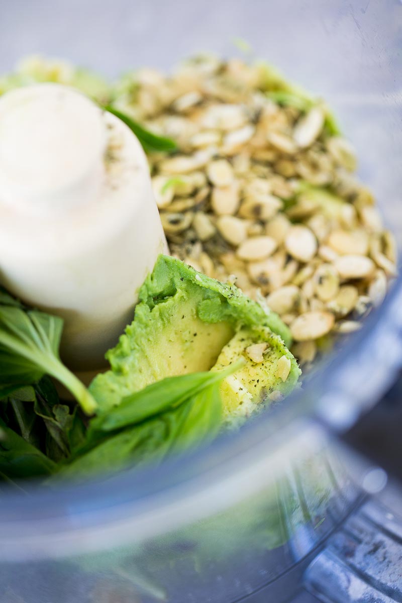 Avocado, pepitas and basil in the food processor.