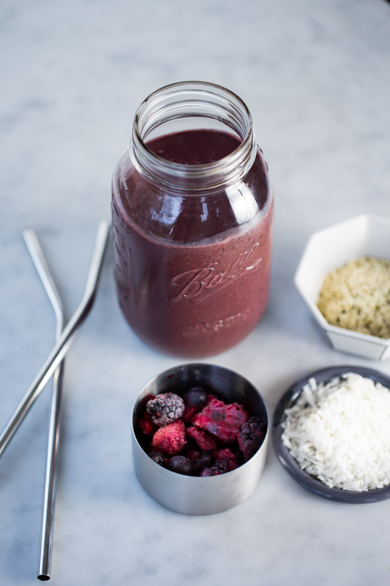 acai smoothie with some ingredients on the side