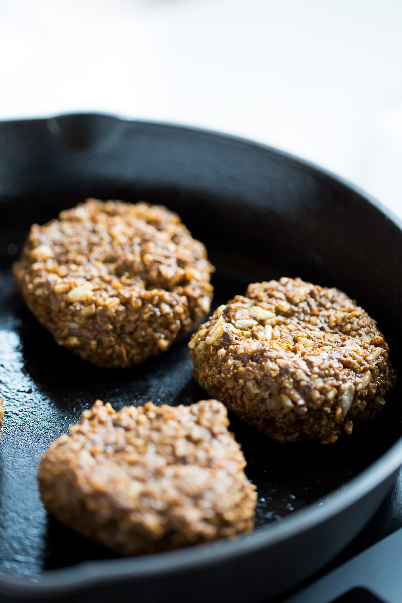 black bean burgers on a iron cast skillet