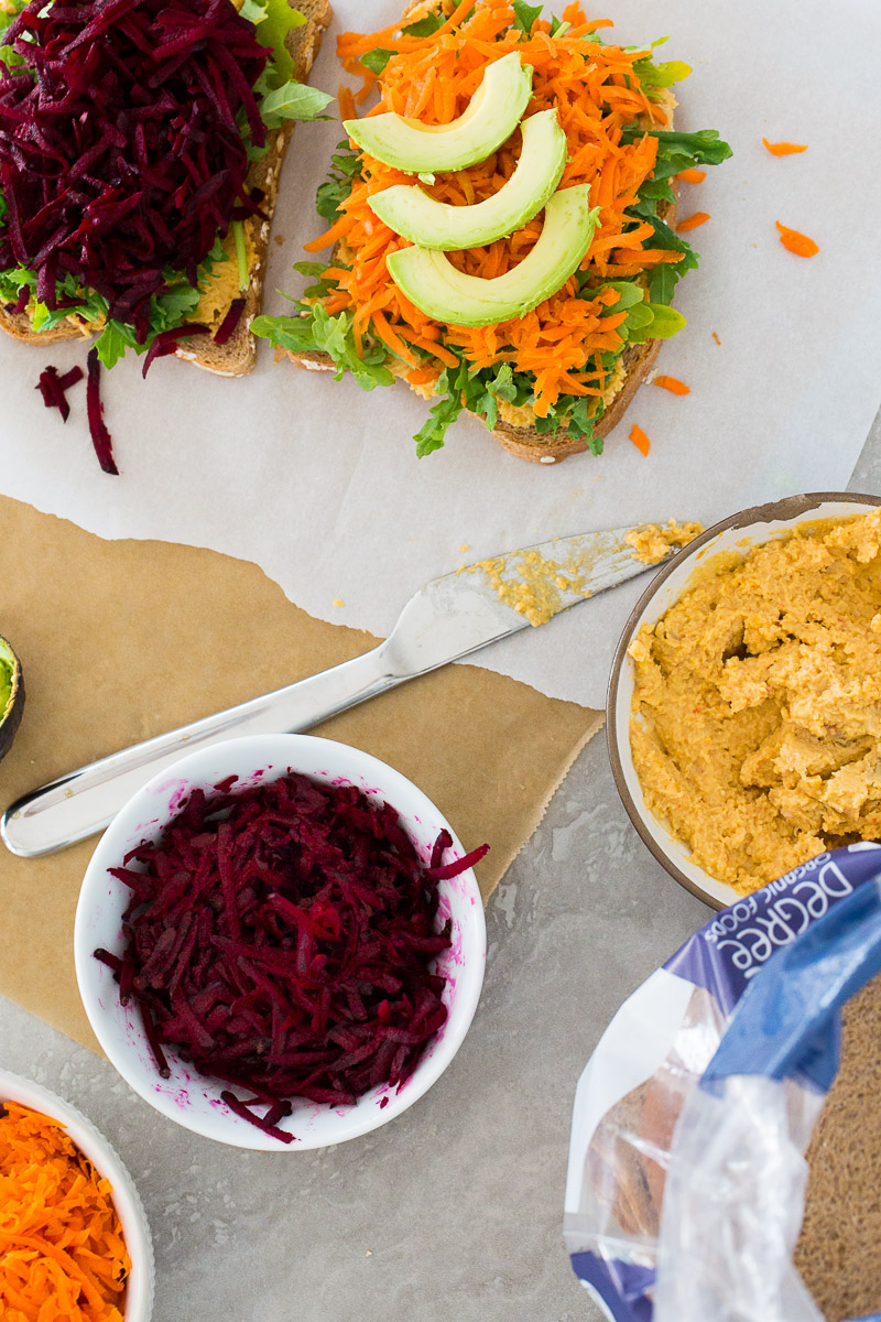 Asembling raw vegetable sandwiches