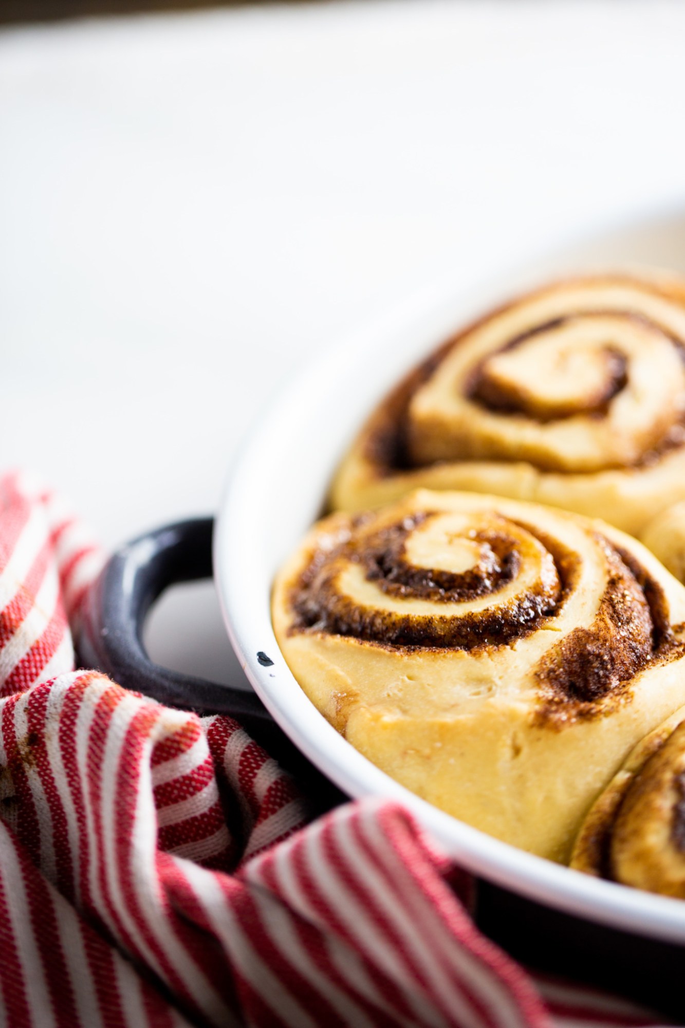 vegan cinnamon rolls in a pan