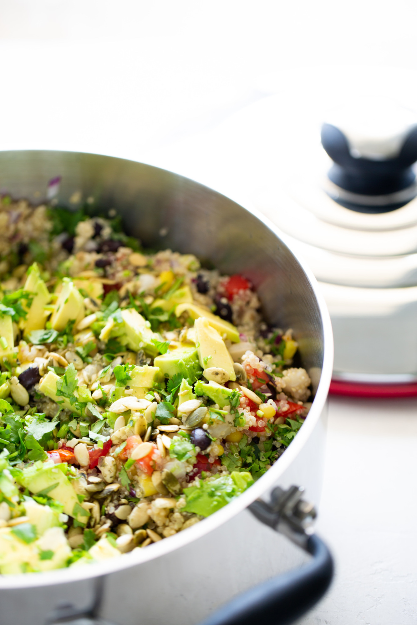 Mexican quinoa salad with diced avocado, pico de gallo and black beans