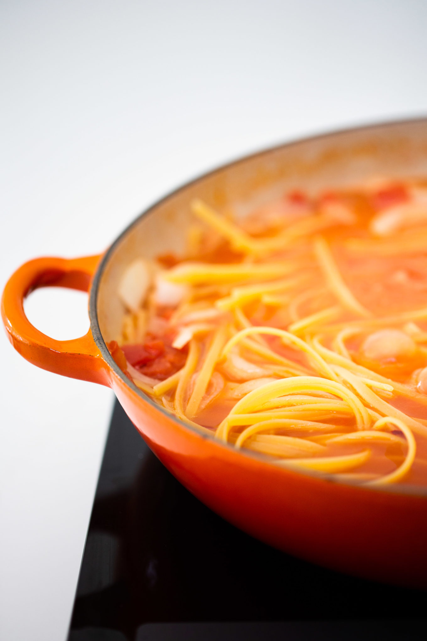 pasta in an cast iron braiser from LeCreuset