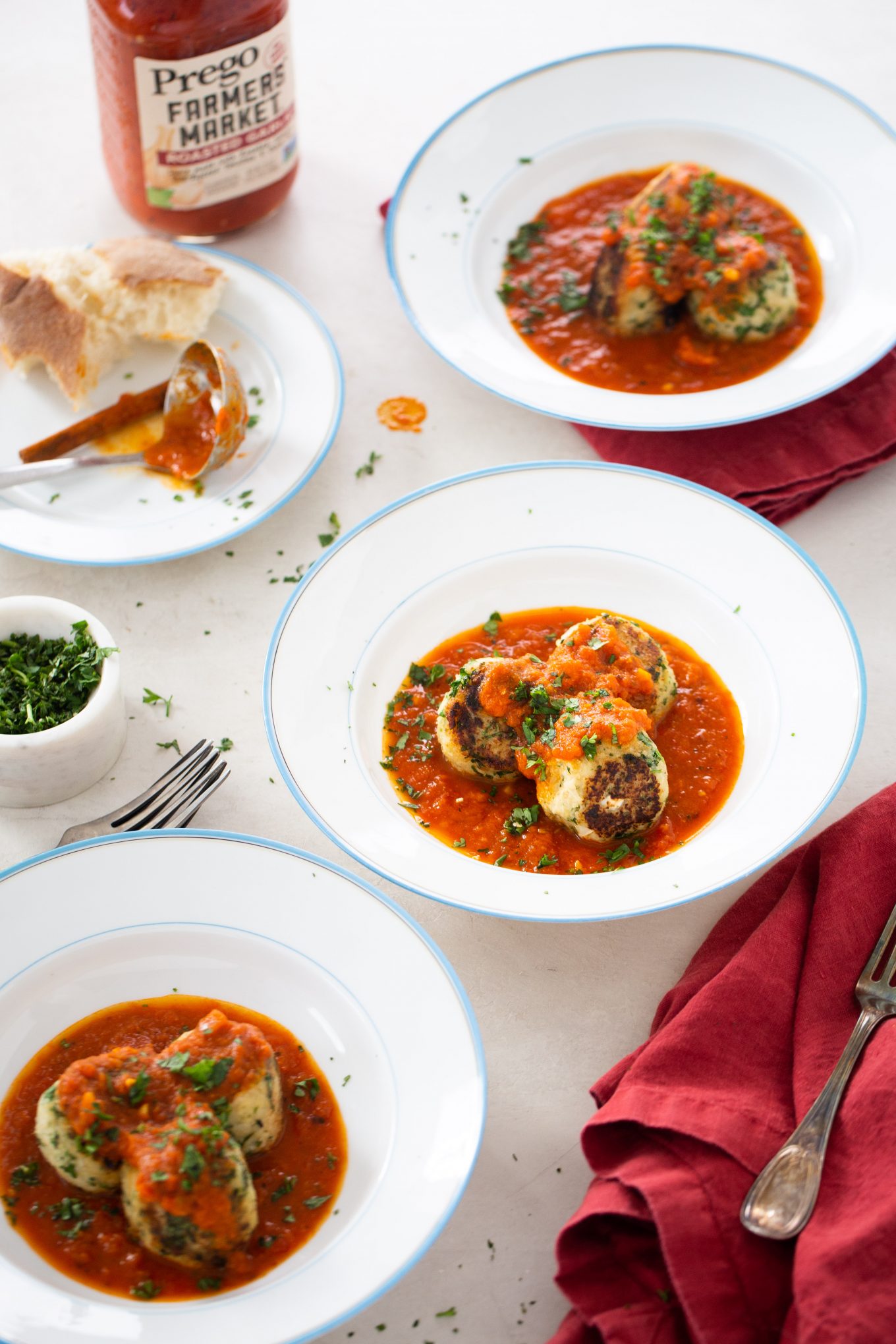 three bowls with vegan cauliflower meatballs