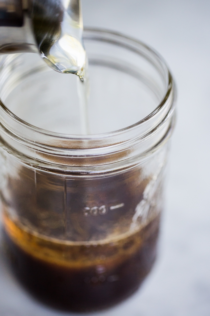 Pouring oil into the jar