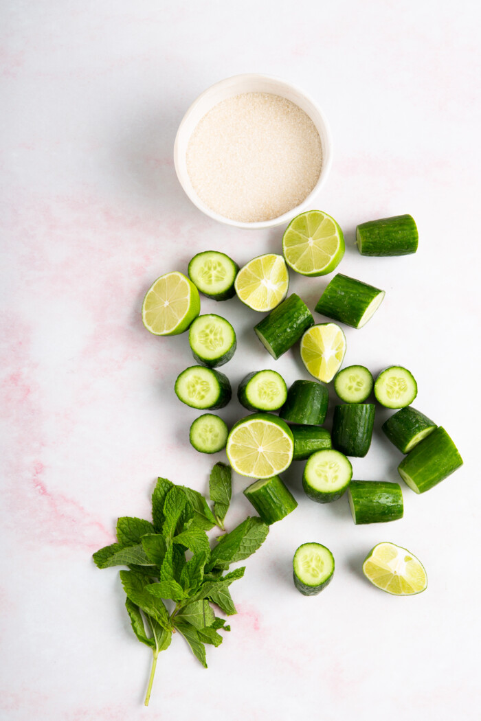 cucumbers, limes and mint leaves