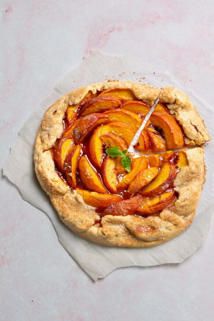 Peach galette on parchemnet paper