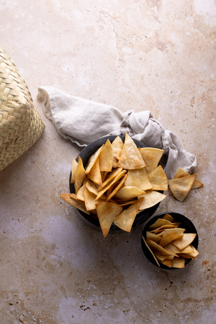 a black bowl with air fryer tortilla chips