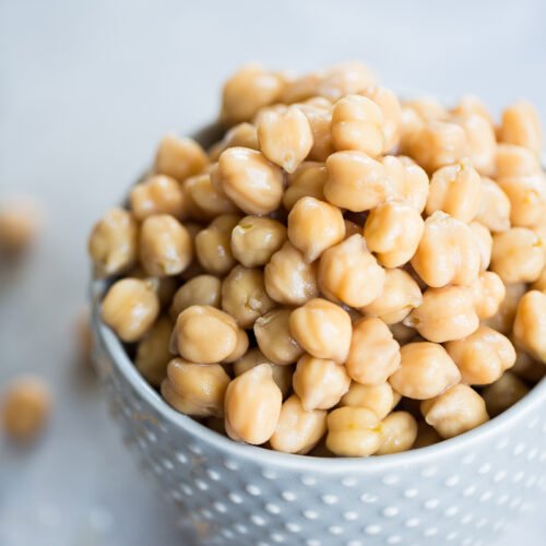 Chickpeas in a bowl on a table.