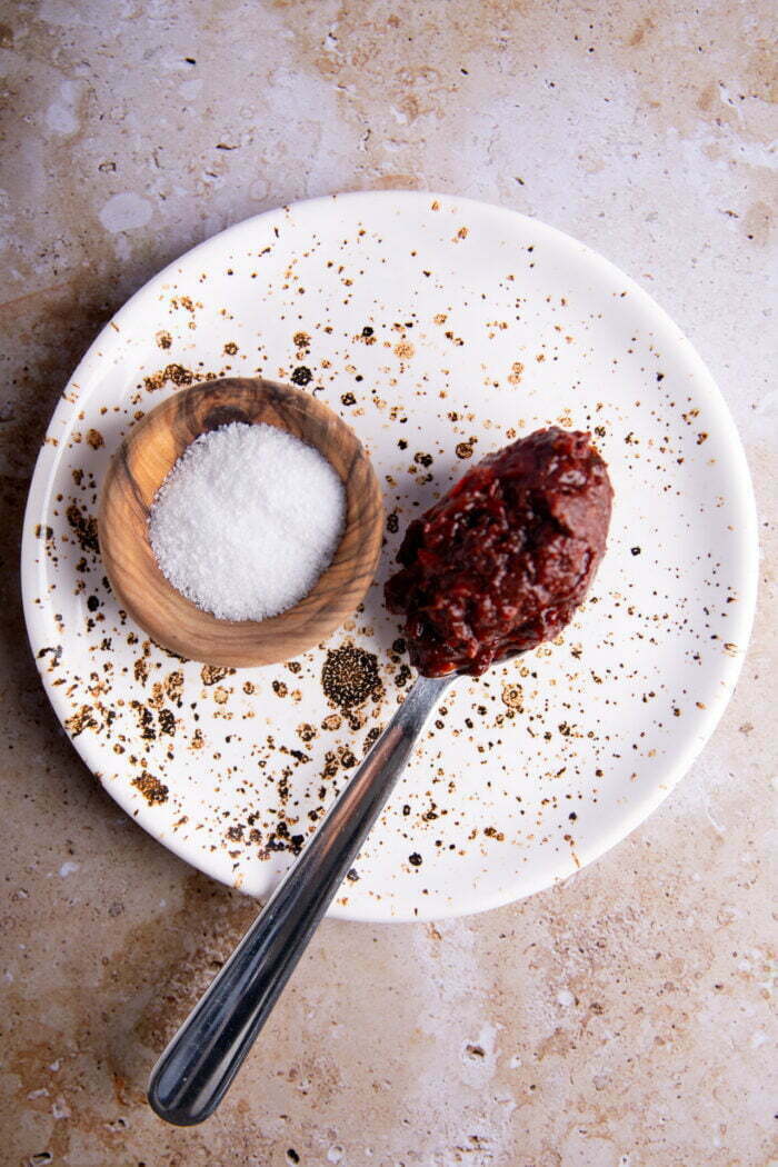 salt and chipotle pepper on a spoon