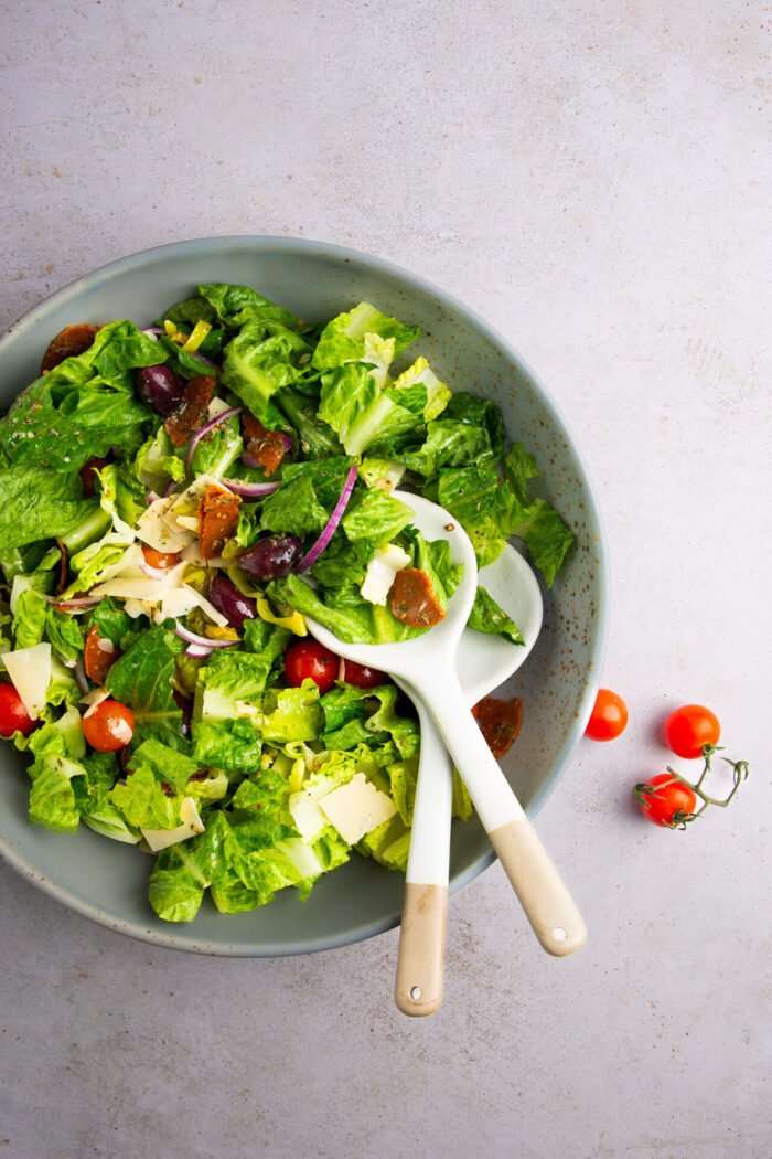 Italian salad on a blue platter