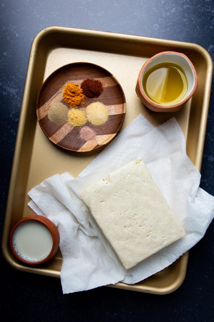 especials, oil, milk and a block of tofu