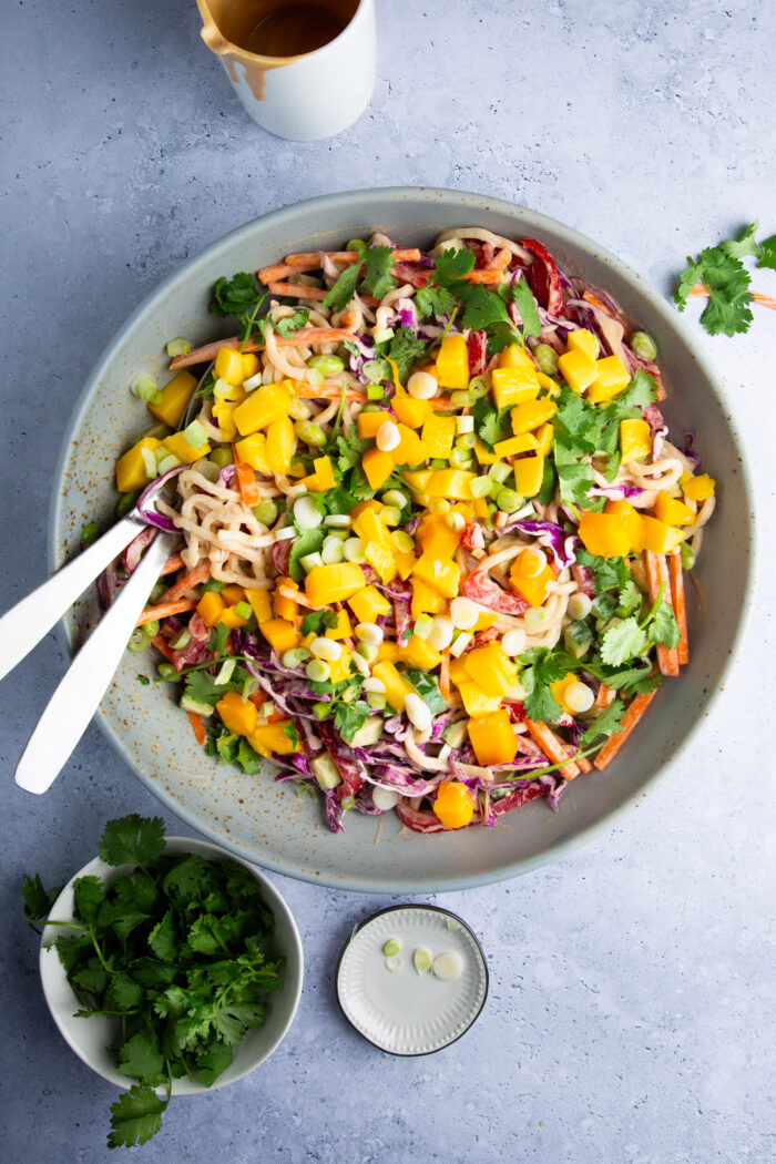 Asian inspired noodle salad with edamame and mango