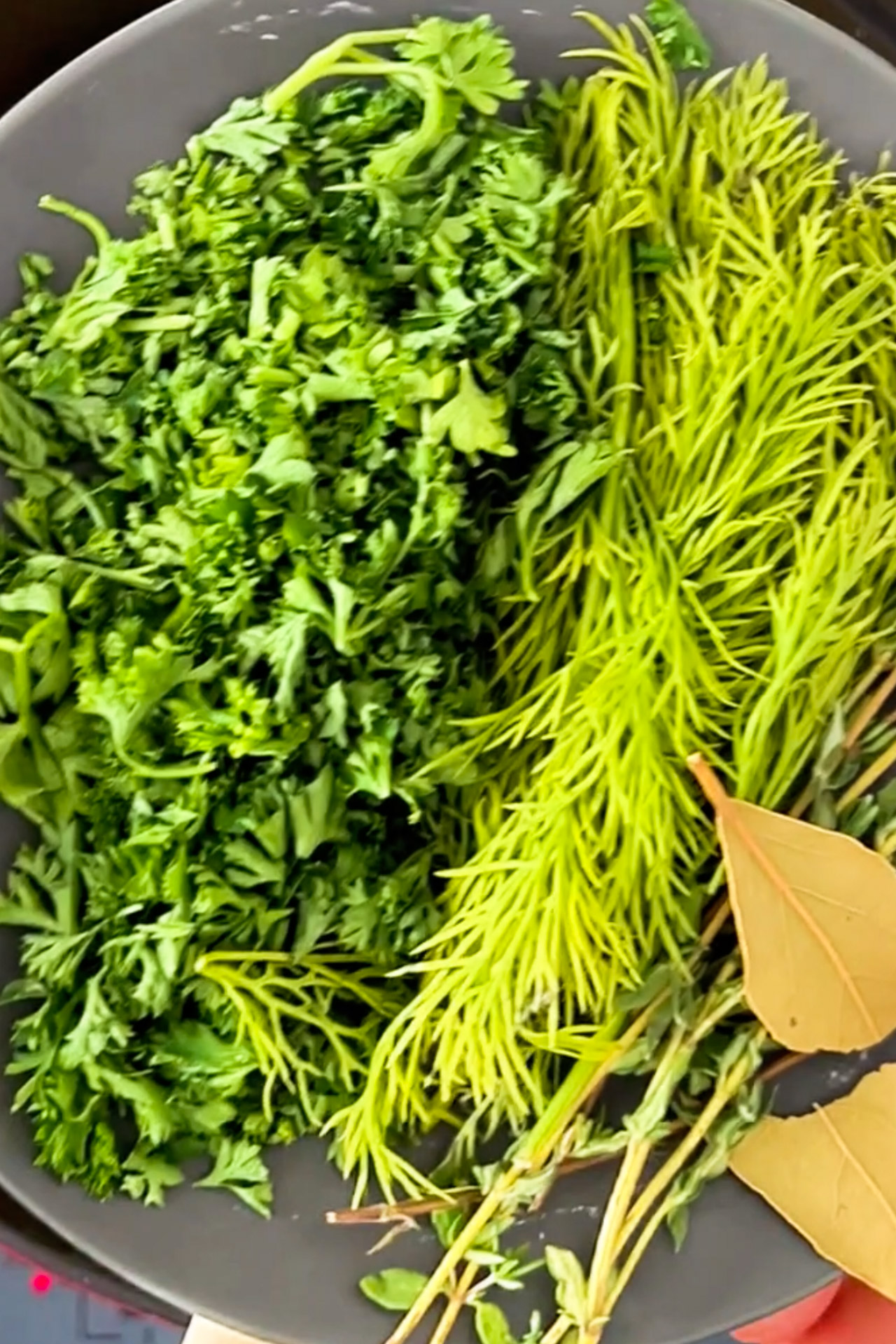 Thyme and sage in a frying pan.