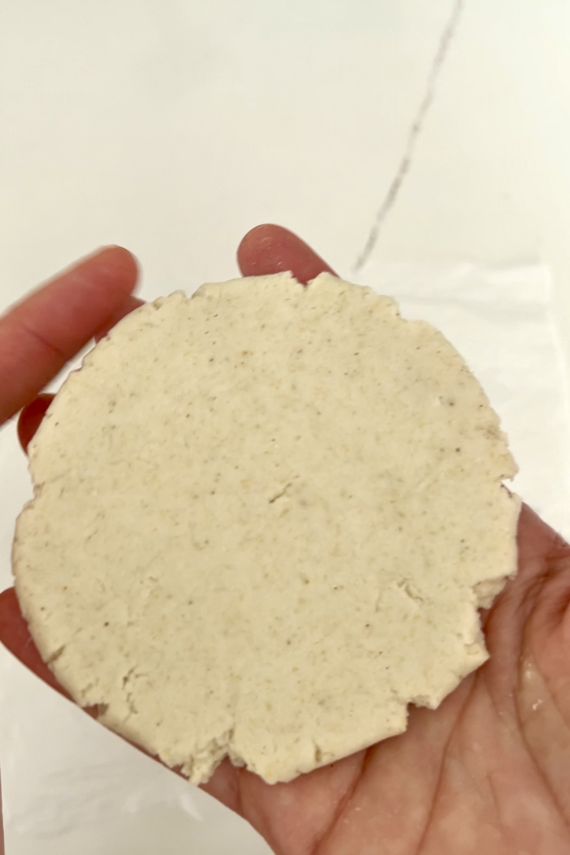 holding a raw sope