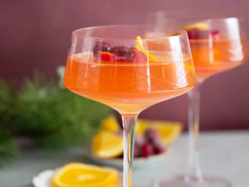 Festive Mimosa with Orange-Cranberry Ice Cubes | Holiday Brunch Drink